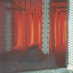 Look inside red hot zone of a gas fired enameling furnace with radiant tubes during enameling operations