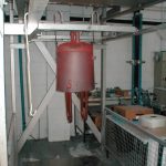 Testing powder enamel application inside complex water heater